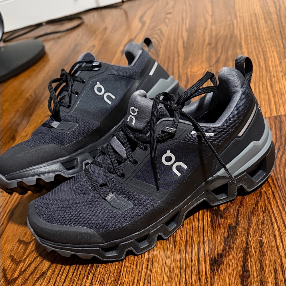 On Running Black and Gray Trail Sneakers